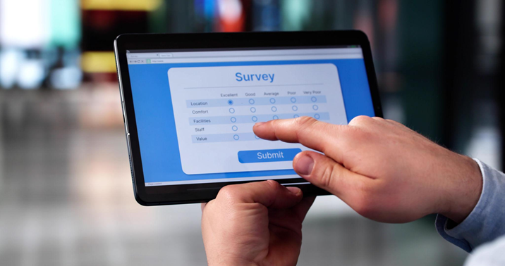 Customer feedback survey on a laptop showing online survey responses